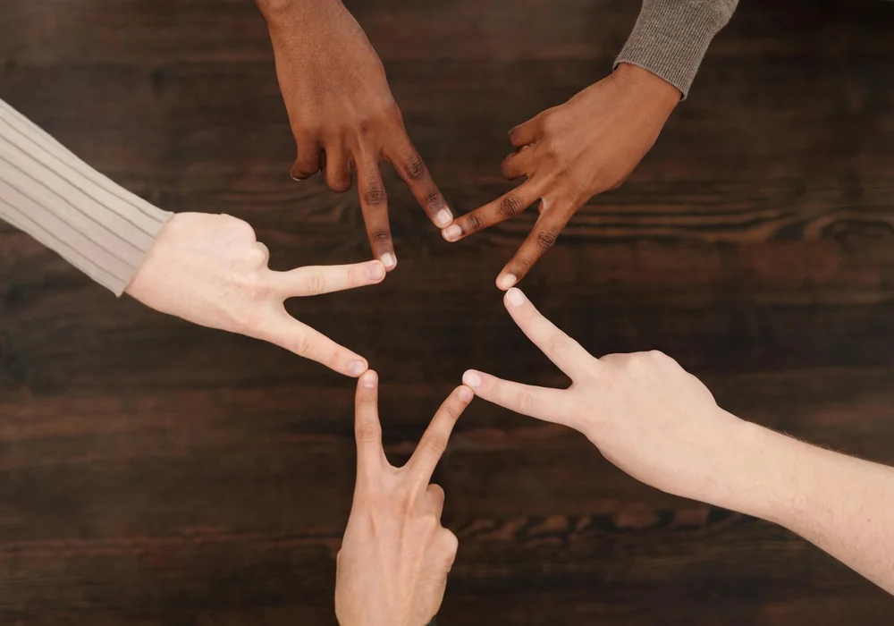 Inclusive team hands